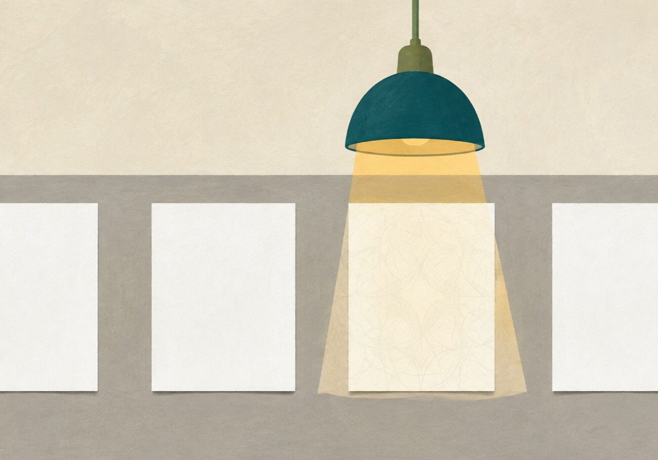 Four identical sheets of paper on a desk with only the one under the lamp revealing a hidden watermark, representing AI text watermarks that only the company that made them can read.