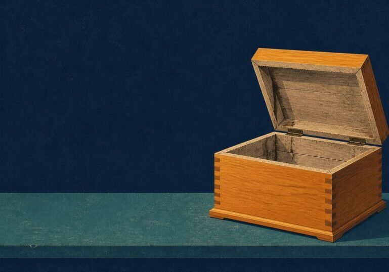 A finished wooden box, lid open, revealing a raw unfinished interior: the vibe coding problem in one picture.